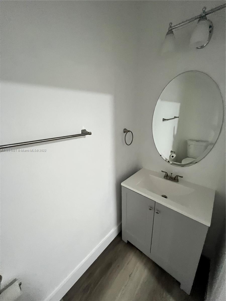 Vizcaya Miramar, FL 33027 - Photo 13 of 15 a bathroom with a sink and mirror