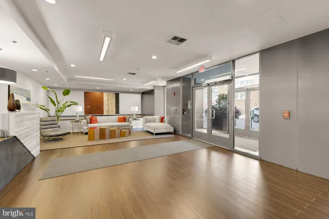 a view of a living room and a large window