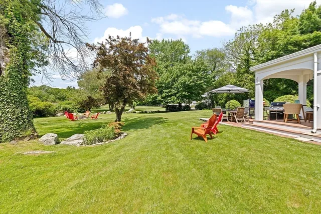 a view of a house with swimming pool and porch