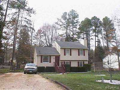 2706 Brookforest Road Midlothian, VA 23112 - Photo 1 of 1 front view of a house with a yard