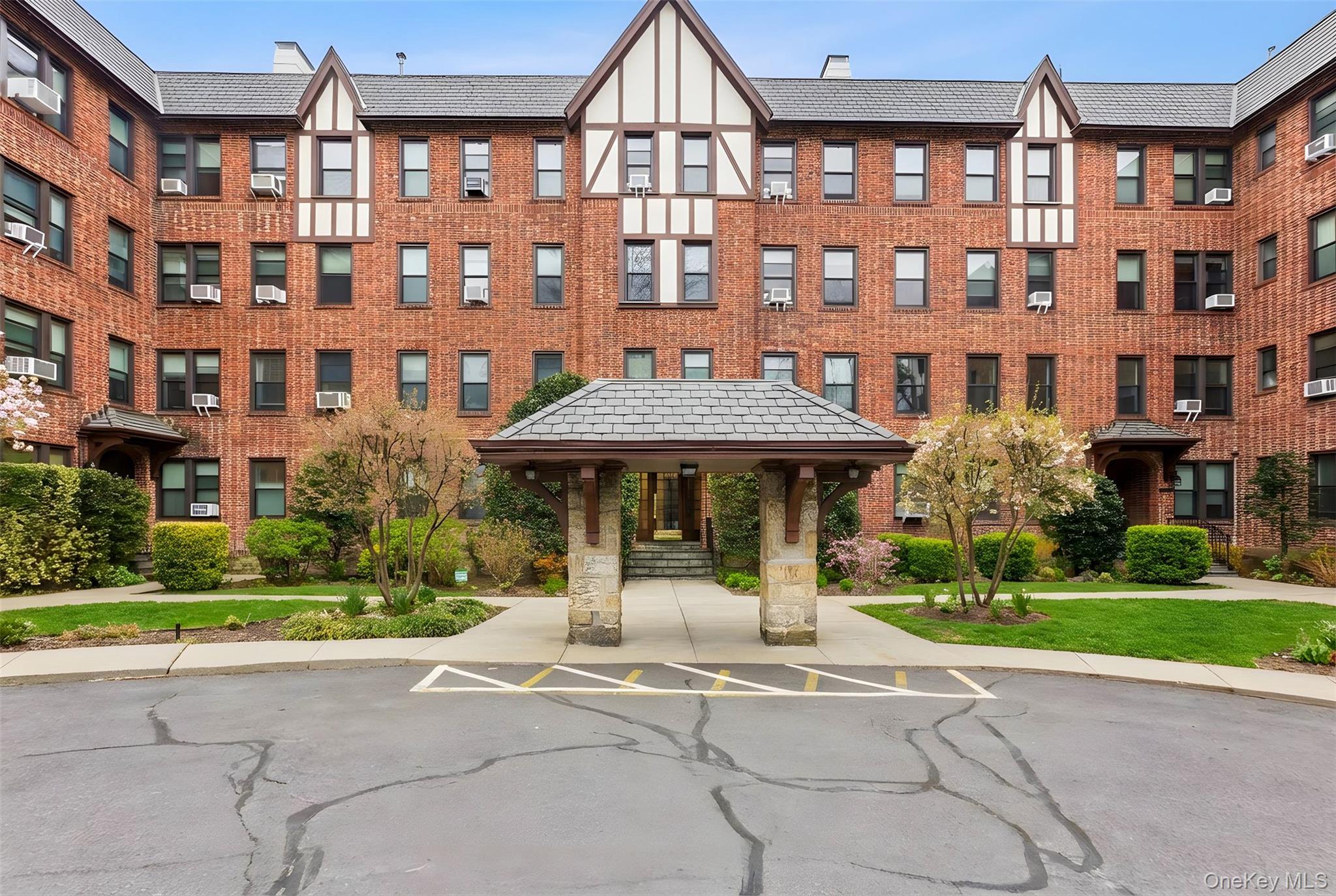 242 Bronxville Road, Unit E2 Bronxville, NY 10708 - Photo 3 of 19 View of apartment building in a classic tudor style