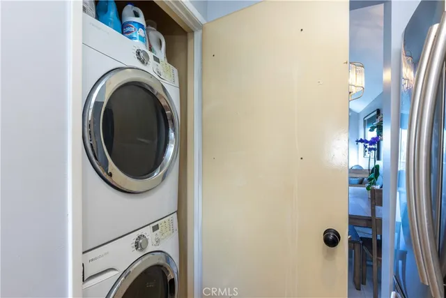 a view of livingroom with washer and dryer