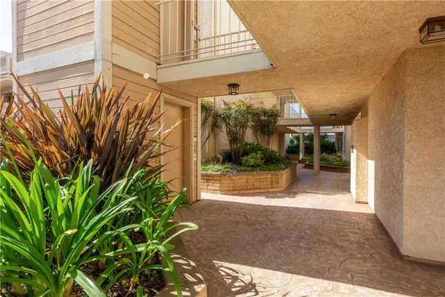 a view of a back yard of the building