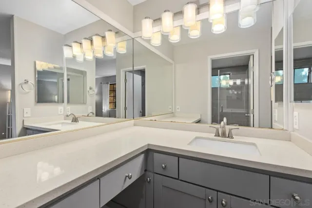 a bathroom with a shower and toilet