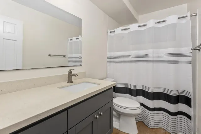 a view of a hallway with washer and dryer