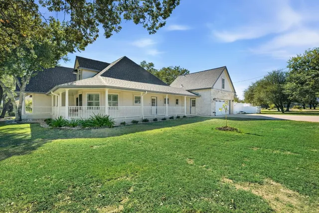 an outdoor space with lots of trees