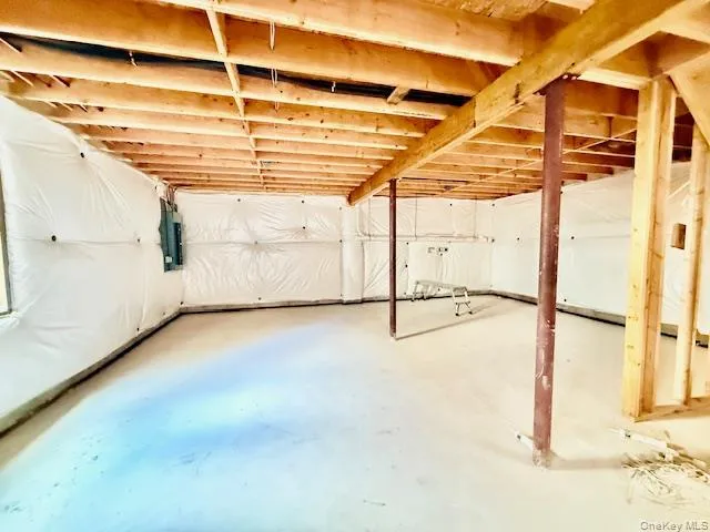 a view of a room with wooden walls