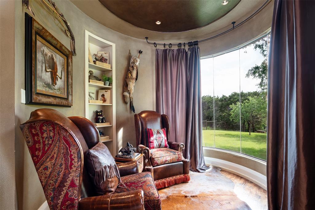 2312 Cactus Rio Lane Weatherford, TX 76087 - Photo 18 of 37 a view of a livingroom with furniture and floor to ceiling window