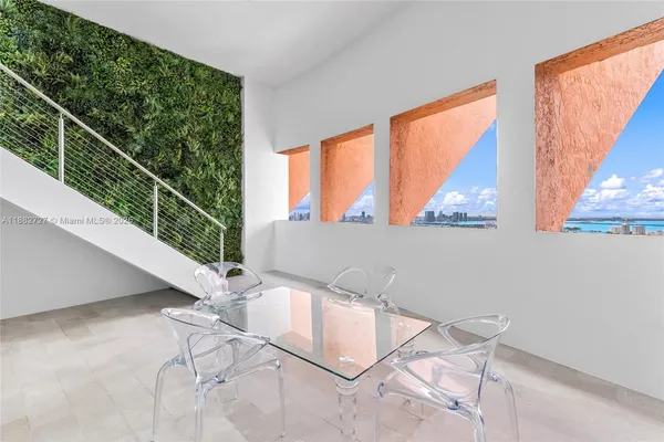 a view of balcony and wooden floor