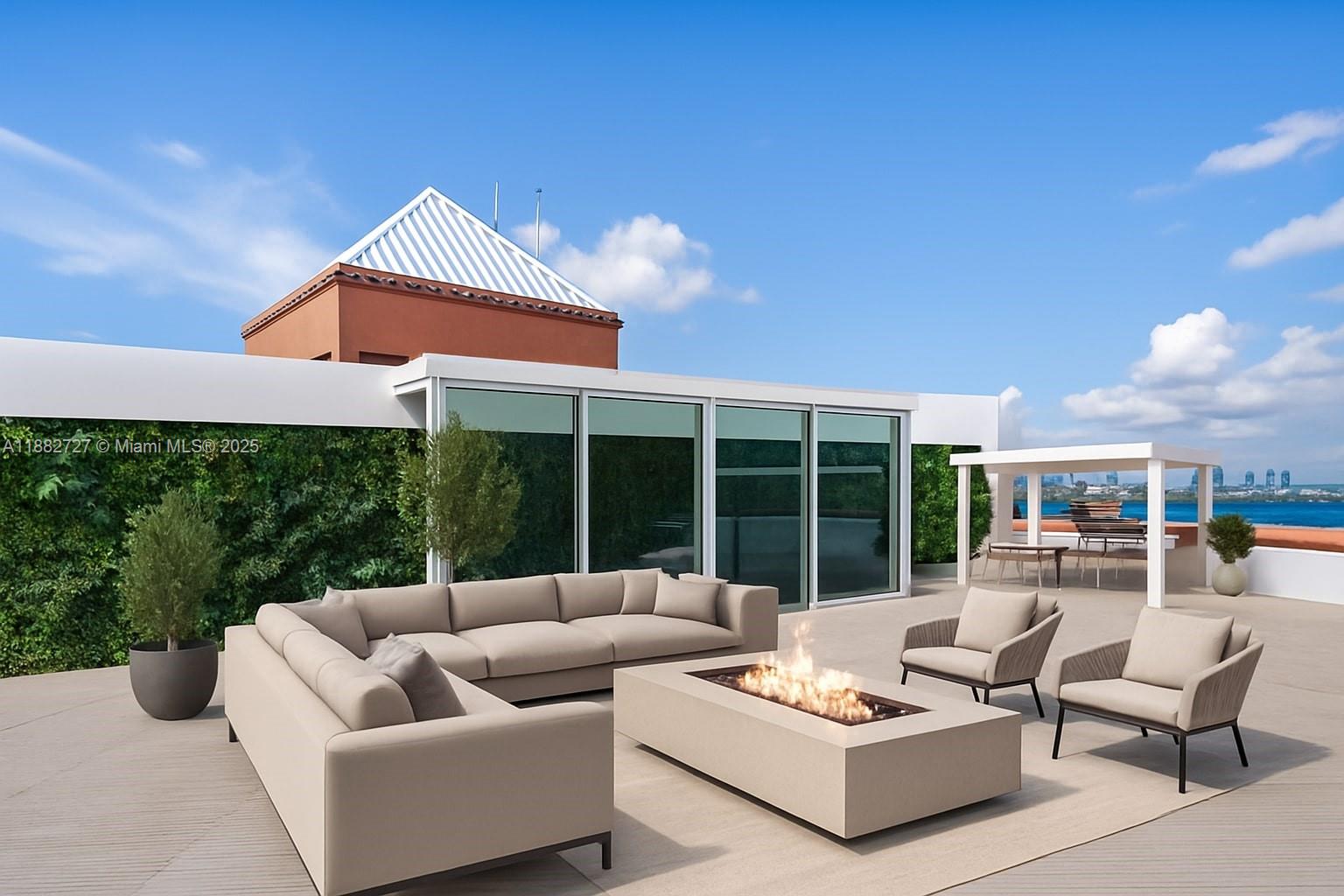 300 South Pointe Drive, Unit PH5 Miami Beach, FL 33139 - Photo 32 of 52 a balcony with furniture and a potted plant