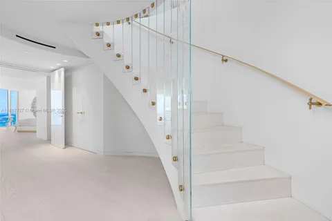 a view of swimming pool from a balcony