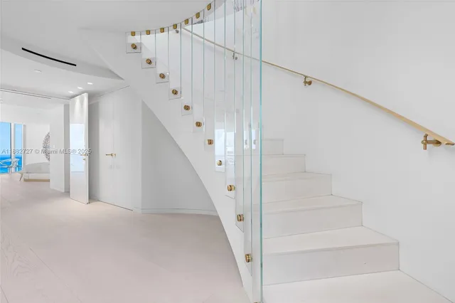 a view of swimming pool from a balcony