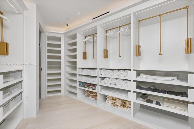 a bathroom with a shower sink and mirror