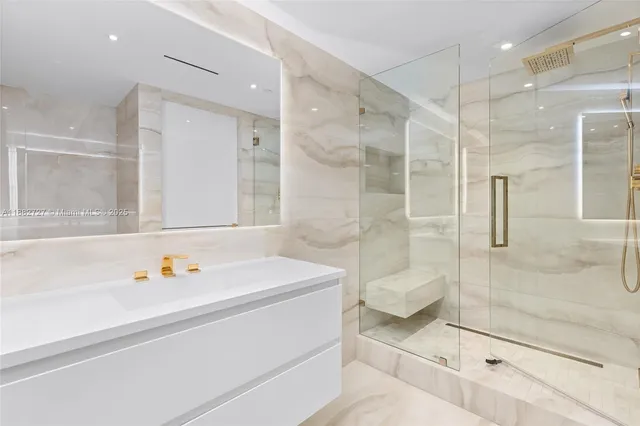 a bathroom with a sink and cabinets