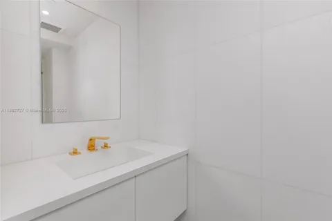 a view of a swimming pool with outdoor seating