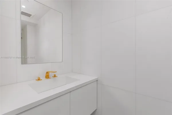 a view of a swimming pool with outdoor seating