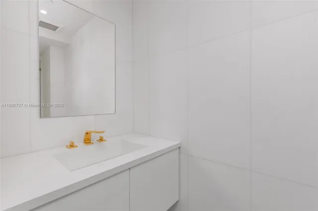 a view of a swimming pool with outdoor seating