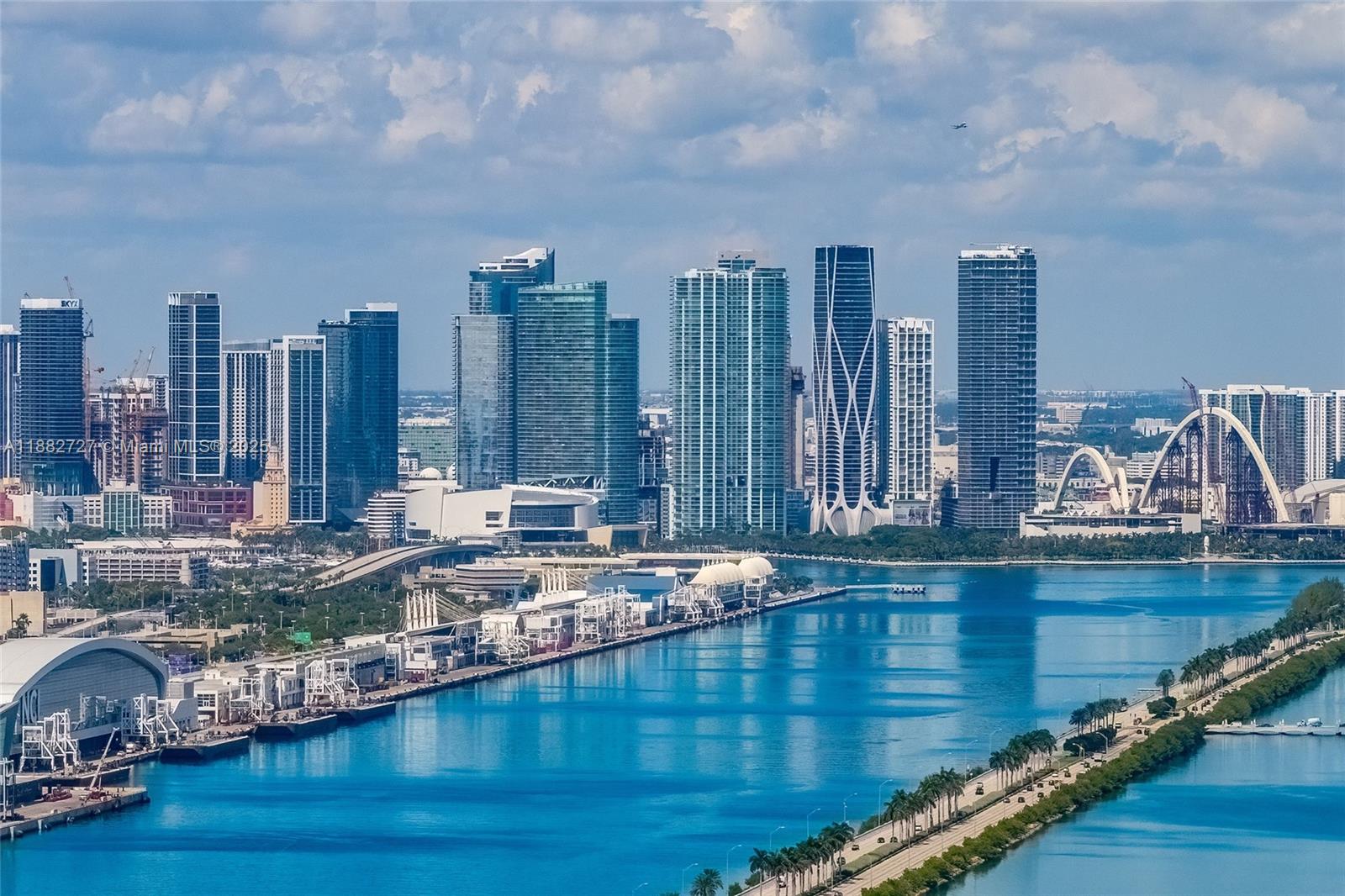 300 South Pointe Drive, Unit PH5 Miami Beach, FL 33139 - Photo 50 of 52 a view of a swimming pool with outdoor seating