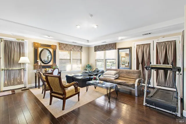 a living room with furniture and a window
