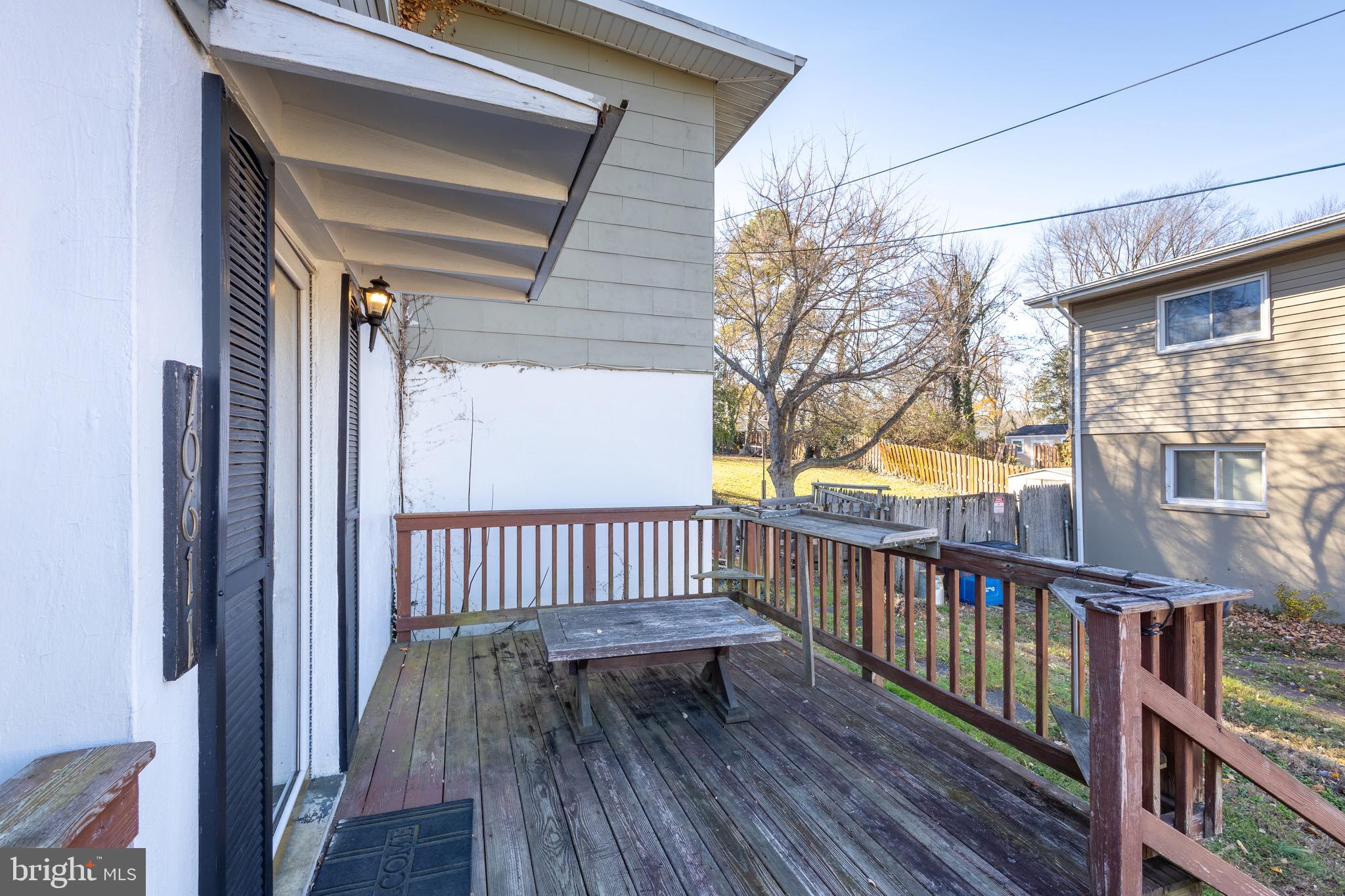 10611 Maple Street Fairfax, VA 22030 - Photo 18 of 20 a view of a wooden deck