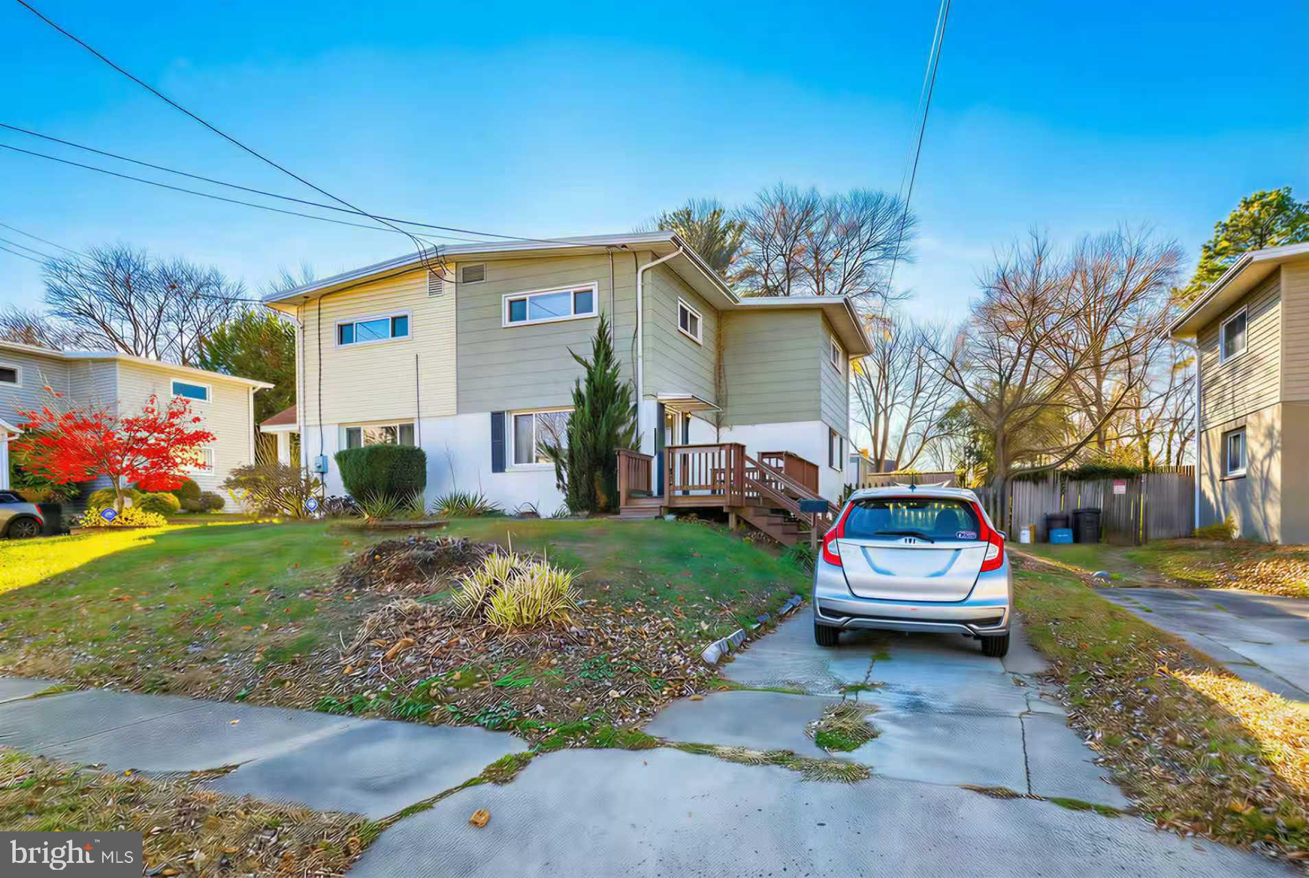 10611 Maple Street Fairfax, VA 22030 - Photo 20 of 20 a view of house with outdoor space and garden