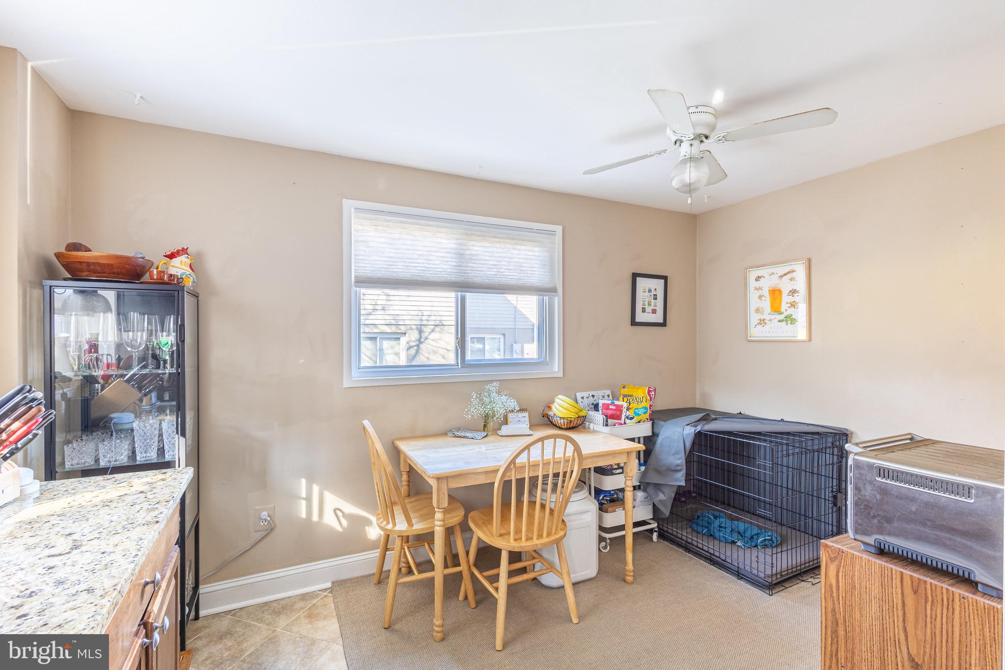 10611 Maple Street Fairfax, VA 22030 - Photo 5 of 20 a dining room with furniture and window