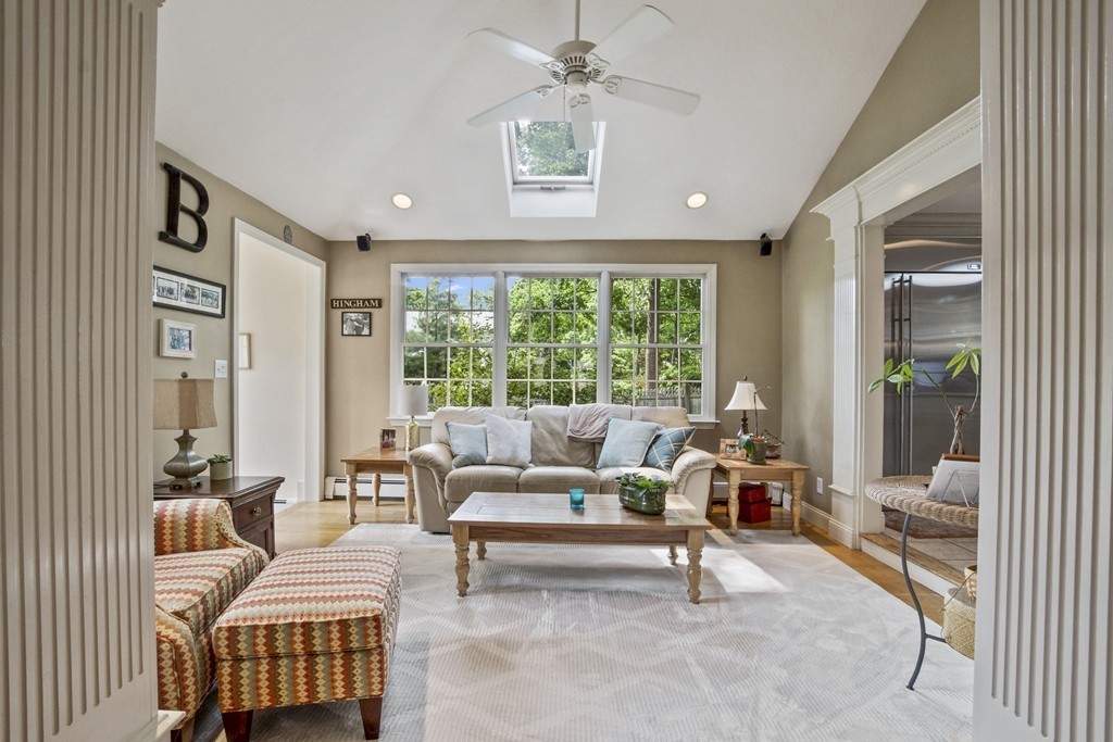 26 Howe Street Hingham, MA 02043 - Photo 12 of 30 a living room with furniture and a large window