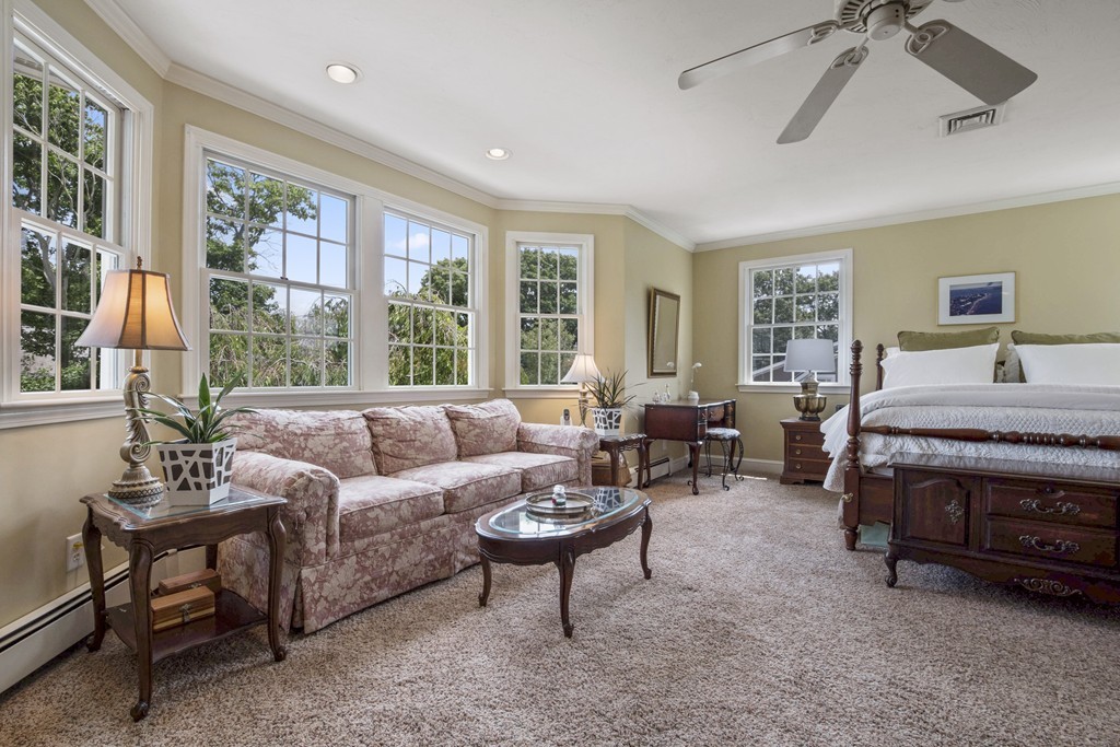 26 Howe Street Hingham, MA 02043 - Photo 17 of 30 a living room with furniture and a large window