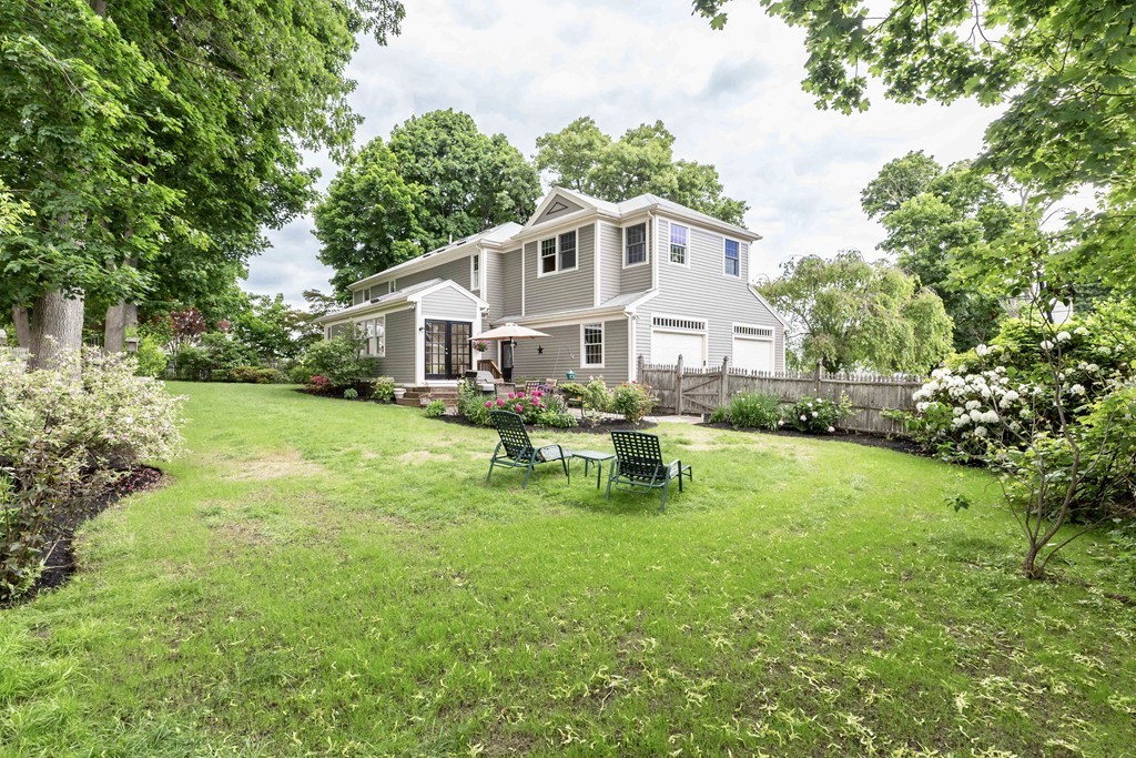 26 Howe Street Hingham, MA 02043 - Photo 30 of 30 a view of a house with a yard patio and sitting area