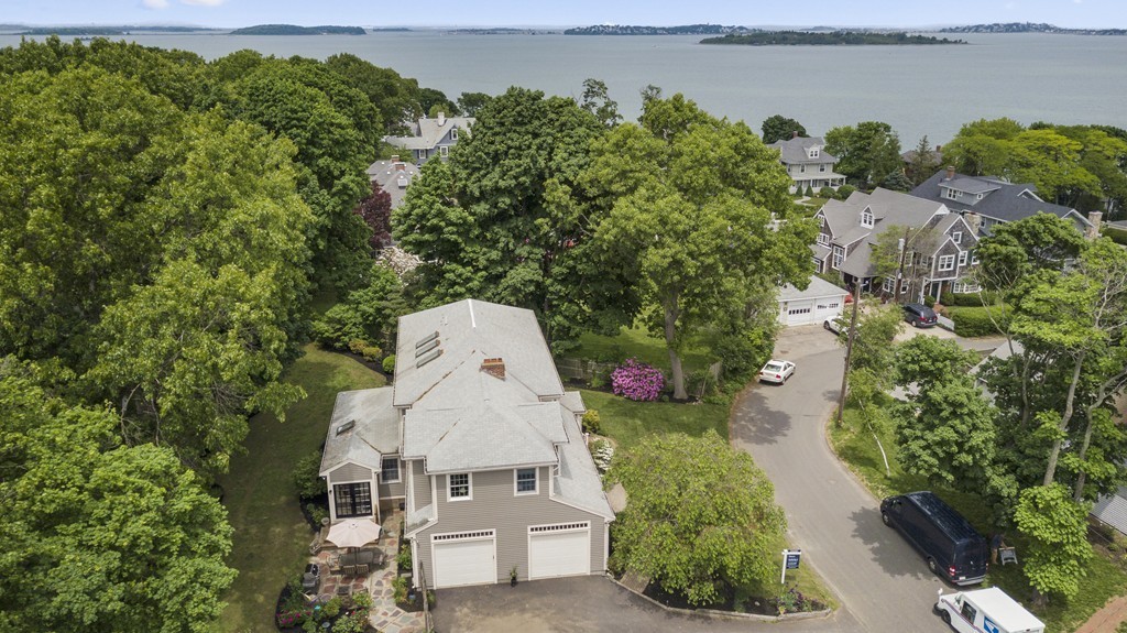 26 Howe Street Hingham, MA 02043 - Photo 5 of 30 an aerial view of a house with a yard and lake view