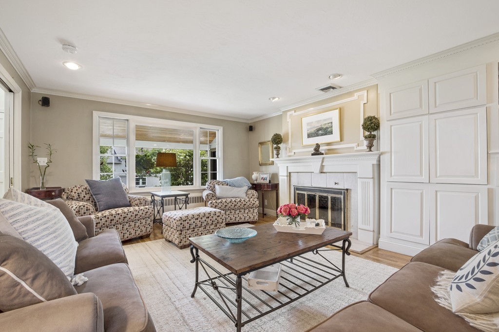 26 Howe Street Hingham, MA 02043 - Photo 7 of 30 a living room with furniture fireplace and window