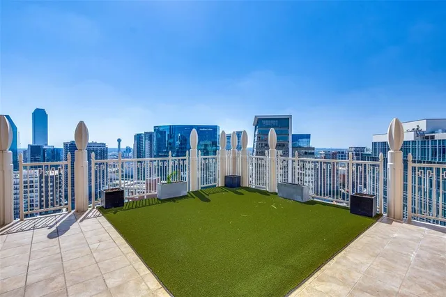 a view of a city with tall buildings