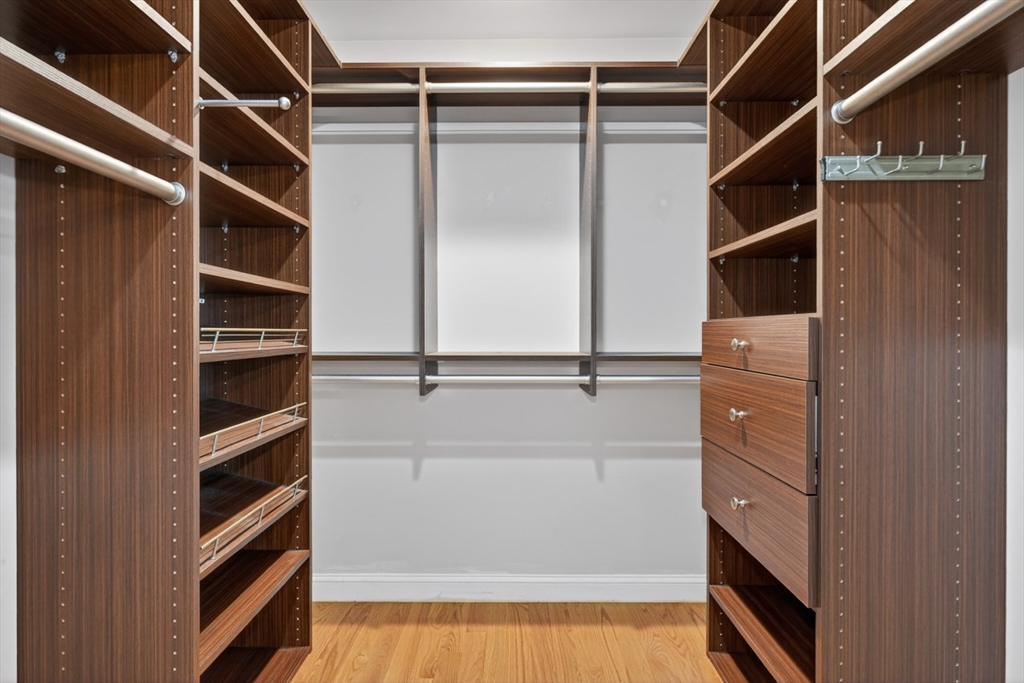 23 Stearns Road Belmont, MA 02478 - Photo 24 of 42 a view of walk in closet with empty racks