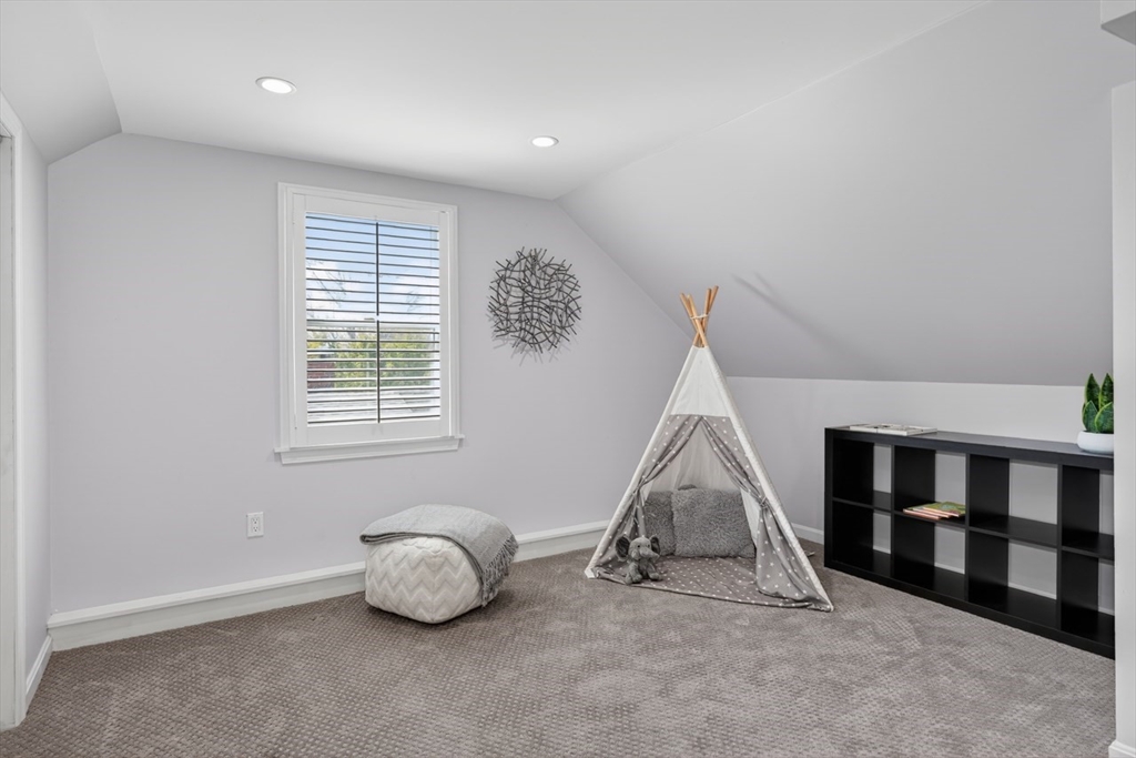 23 Stearns Road Belmont, MA 02478 - Photo 31 of 42 a room with gym equipment and a window