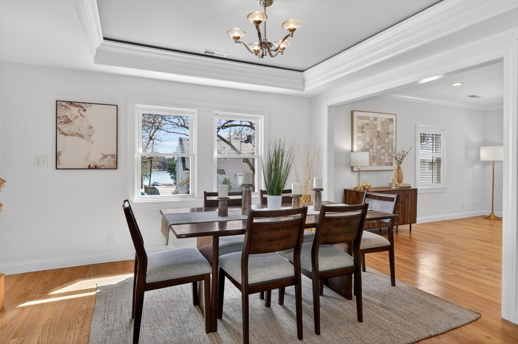 23 Stearns Road Belmont, MA 02478 - Photo 5 of 42 a view of a dining room with furniture and wooden floor