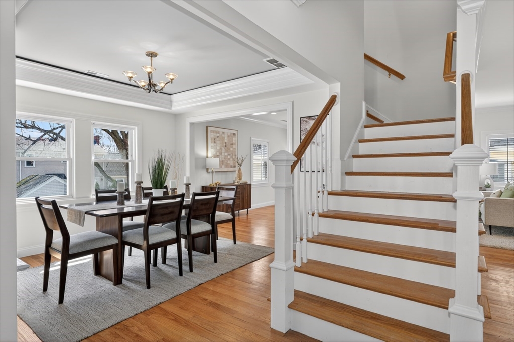 23 Stearns Road Belmont, MA 02478 - Photo 6 of 42 a view of a dining room with furniture and wooden floor