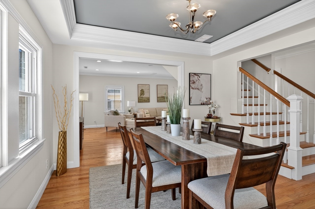 23 Stearns Road Belmont, MA 02478 - Photo 7 of 42 a view of a dining room with furniture and wooden floor