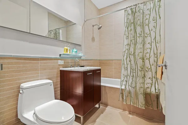 a lobby with furniture and floor to ceiling windows