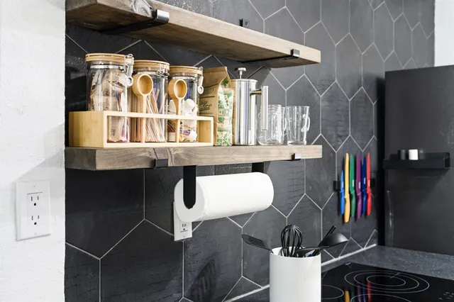 a dining room with furniture and a window