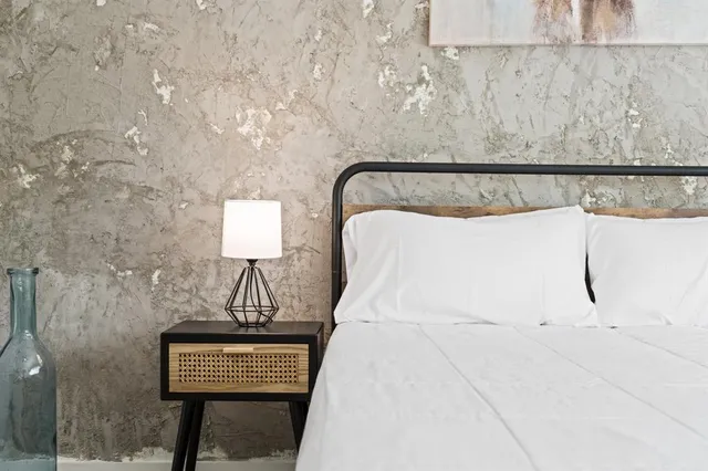 a picture of a bench in a bathroom