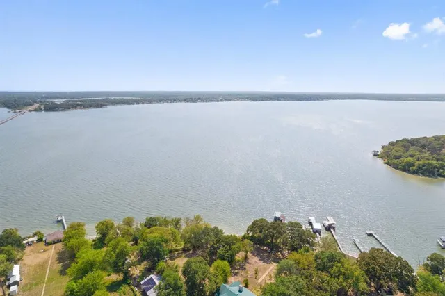 an aerial view of ocean with residential space