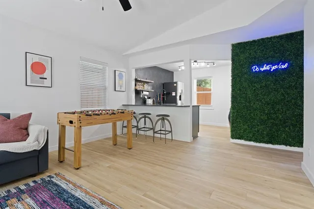 a living room with furniture and a table