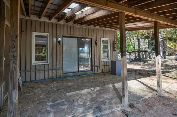 an empty room with a empty space and window