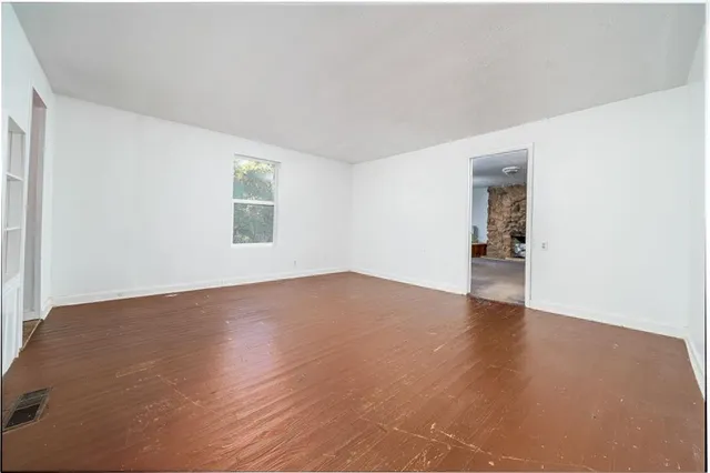 a view of porch with wooden floor