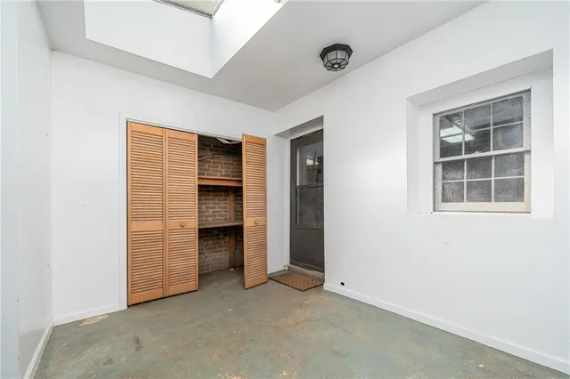 an empty room with windows