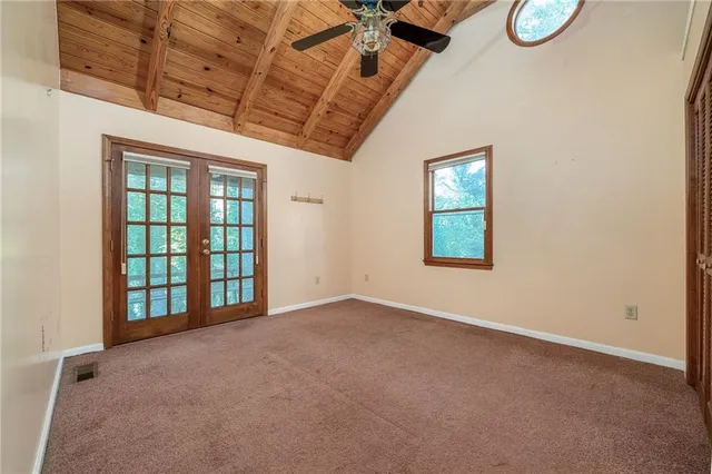 a view of a yard with a tree