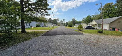 a view of a street with a houses