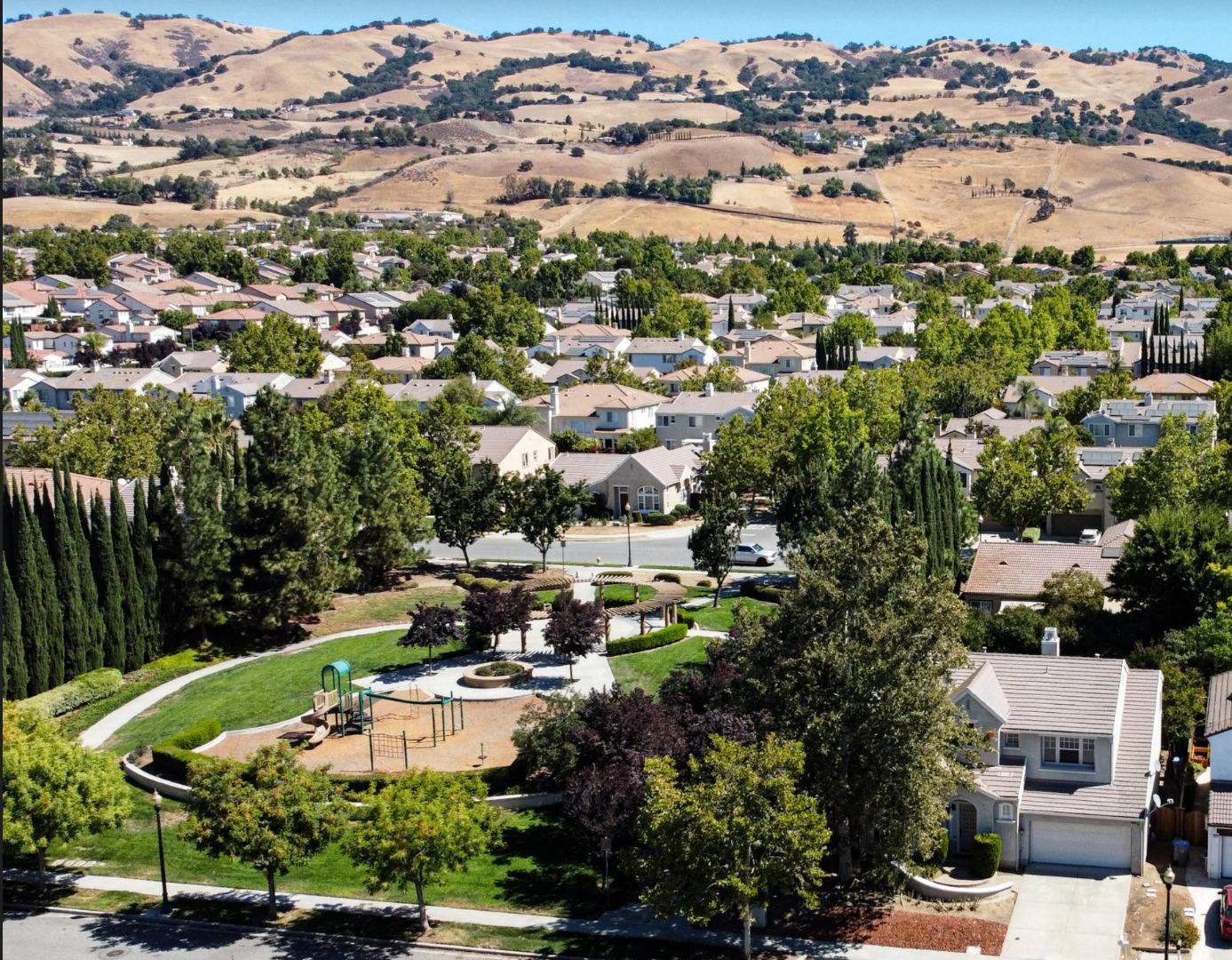 3970 Louvre Avenue San Jose, CA 95135 - Photo 3 of 5 an aerial view of residential houses with outdoor space