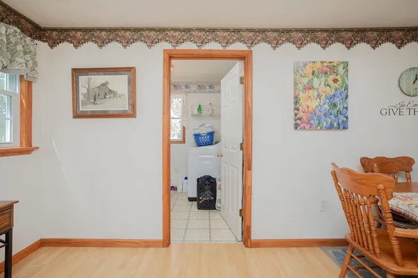 a view of a bathroom with a shower and a sink