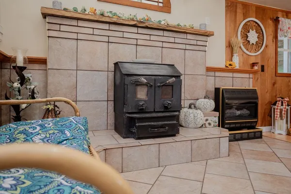 a kitchen with a stove and a refrigerator